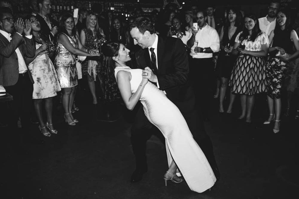 london wedding photography by Tomas of bride and groom dancing - black an white photograph